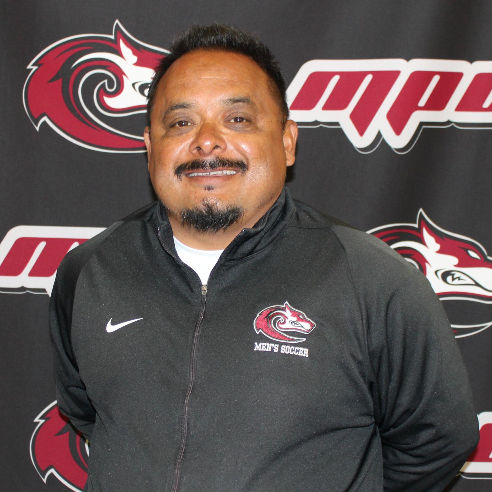 Head Coach Mark Cisneros