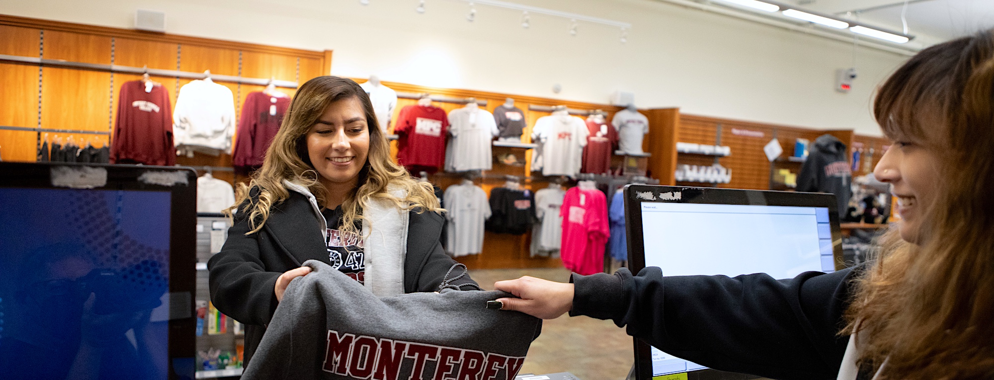 MPC Student Purchasing Lobo Merch in Bookstore